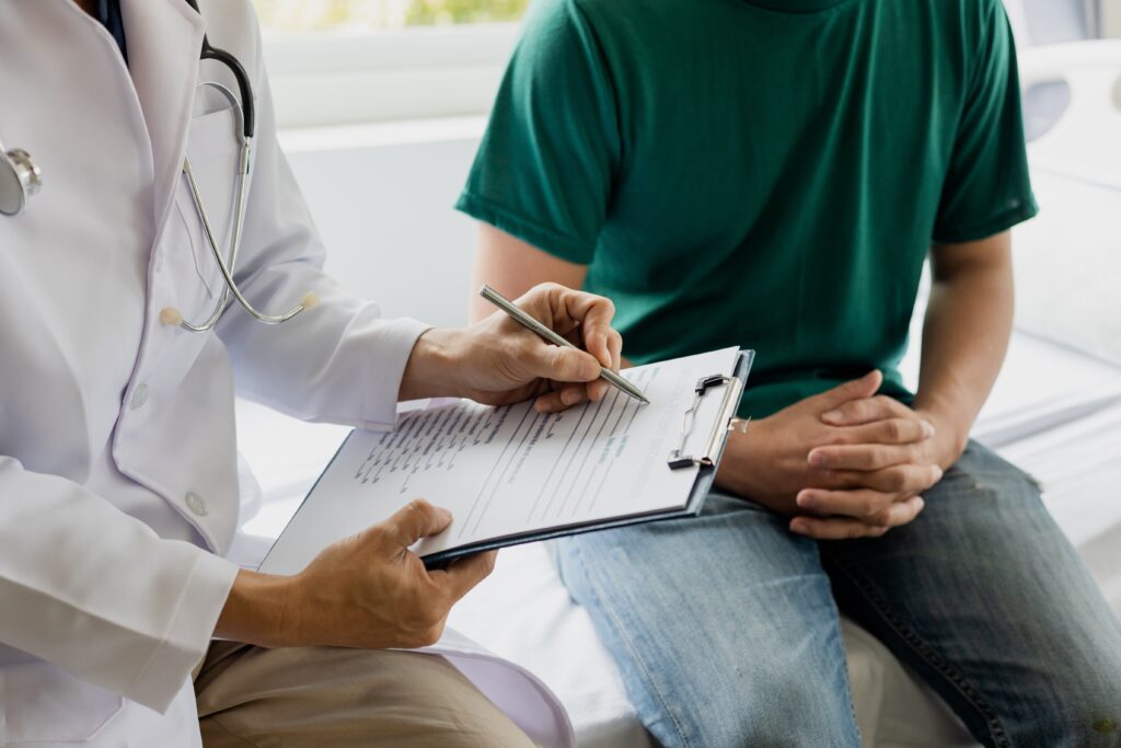 Close up of a man having a consultation with his doctor about his testosterone levels